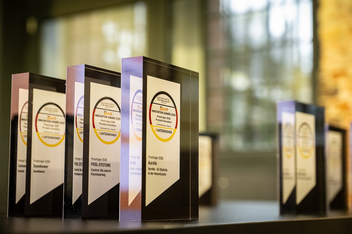 The Product Innovation trophies lined up, including aurelle